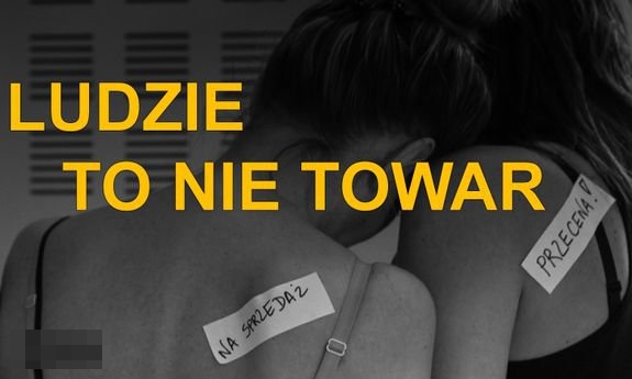 dwie kobiety odwrócone plecami. Tekst: LUDZIE TO NIE TOWAR