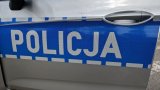 drzwi radiowozu z napisem POLICJA