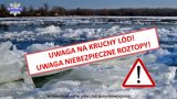 widok rzeki z kawałkami kry i lodu w oddali drzewa i budynki mieszkalne.

Na środku zdjecia napis UWAGA NA KRUCHY LÓD, UWAGA NIEBEZPIECZNE ROZTOPY.